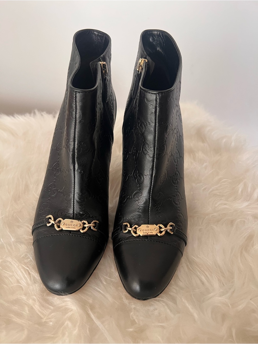 Gucci Black Leather Ankle Boots with Gold Chain Plaque